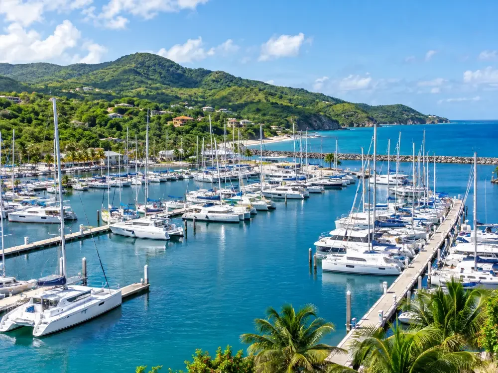 Long docks full of sailboats and catamarans at a big Fajardo marina